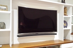 Tv-with-curve-soundbar-wall-mounted