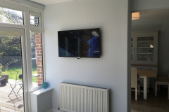 Tv-on-the-wall-above-radiator